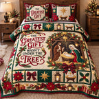 Greatest Gift Nativity quilted 3-piece bedding set on a made bed in a winter-styled bedroom