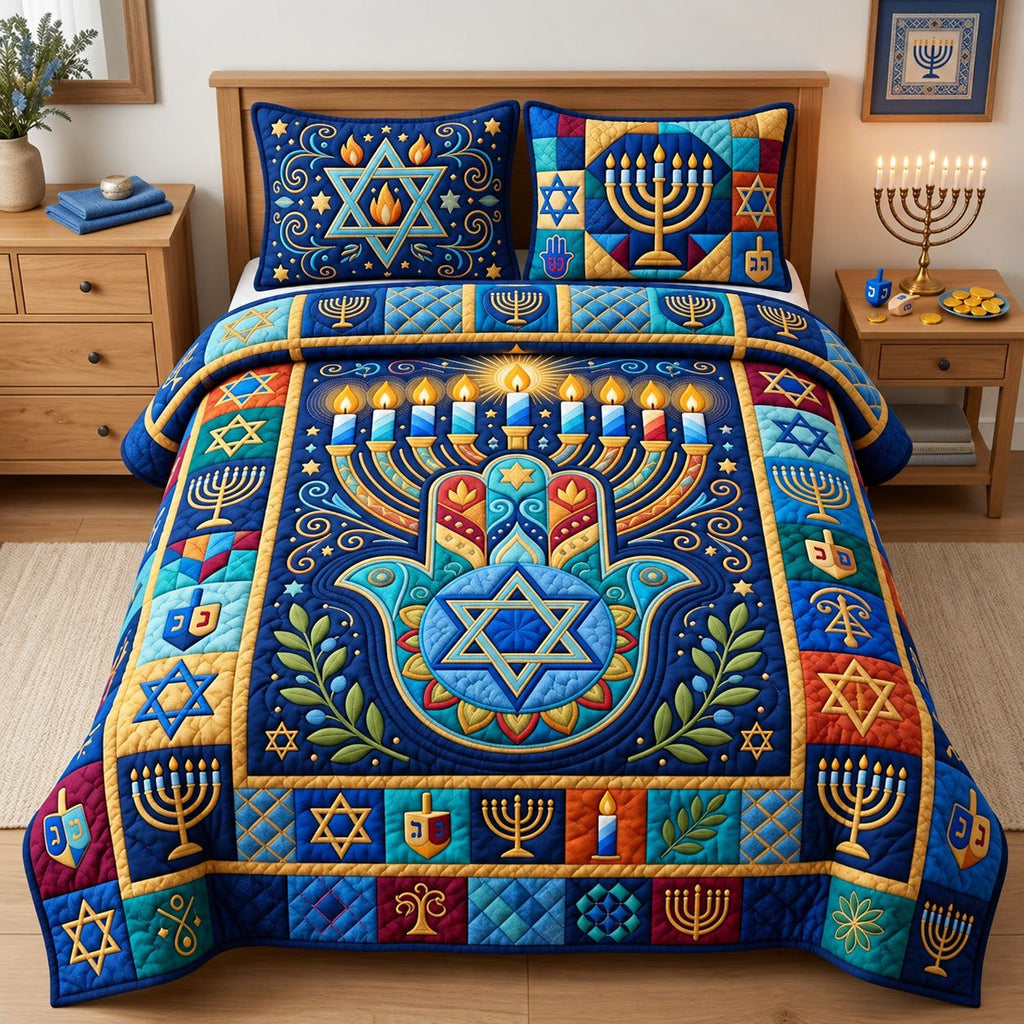 Hamsa Star of David quilted 3-piece bedding set on a made bed with two matching pillow shams
