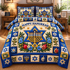 Hanukkah Star Celebration quilted 3-piece bedding set on a made bed with two matching pillow shams