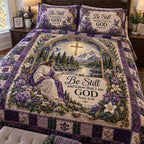 Heavenly Stillness quilted 3-piece bedding set on a made bed in a softly lit bedroom