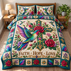Hummingbird Nature Harmony quilted 3-piece bedding set on a made bed with two matching pillow shams
