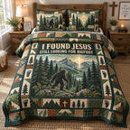 Jesus And Bigfoot quilted 3-piece bedding set on a made bed in a softly lit bedroom