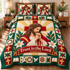 Jesus In Prayer quilted 3-piece bedding set on a made bed in a softly lit bedroom