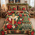 Jesus Poinsettia Cross quilted 3-piece bedding set on a made bed in a winter-styled bedroom