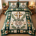 Jesus The Way Green Cross quilted 3-piece bedding set on a made bed in a softly lit bedroom
