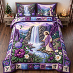 Jesus Waterfall quilted 3-piece bedding set on a made bed in a softly lit bedroom