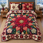Jeweled Poinsettia quilted 3-piece bedding set on a made bed in a winter-styled bedroom