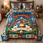 Joyful Nativity quilted 3-piece bedding set on a made bed in a winter-styled bedroom