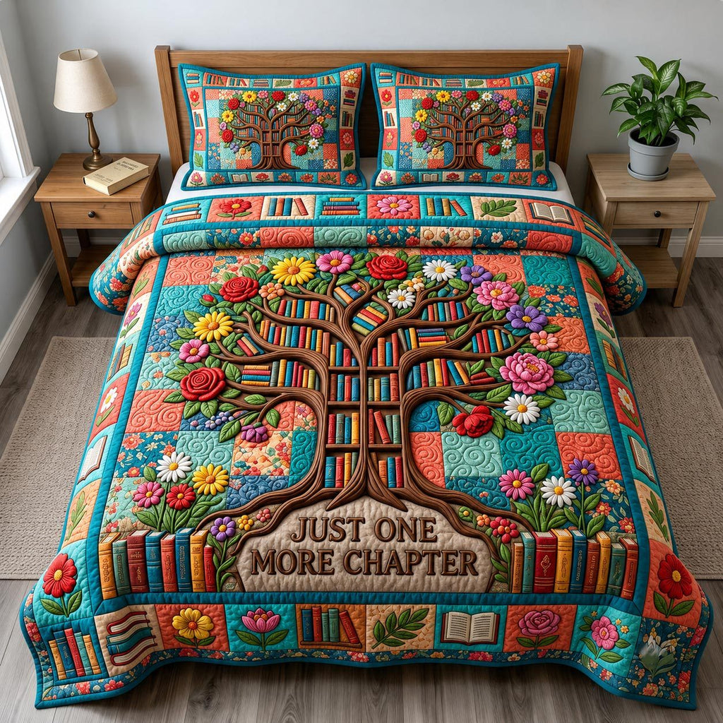Just One More Chapter Tree quilted 3-piece bedding set on a made bed with two matching pillow shams
