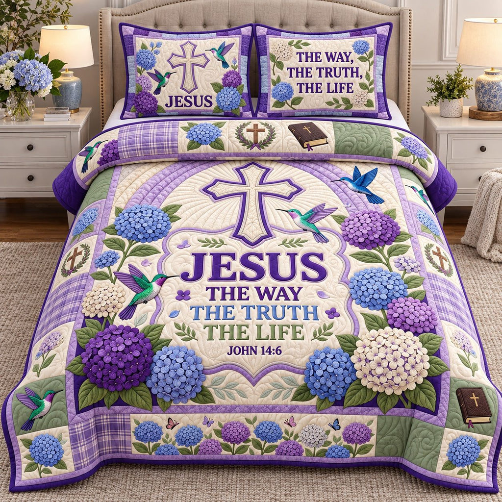 Lavender Hydrangea Jesus Way Truth Life quilted 3-piece bedding set on a made bed in a softly lit bedroom