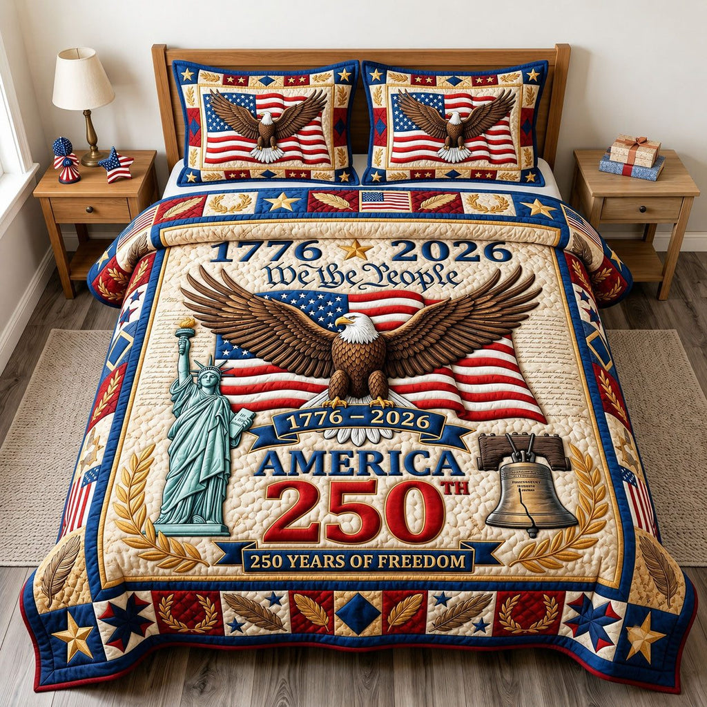 Liberty Legacy Eagle Bell quilted 3-piece bedding set on a made bed in a warmly lit bedroom