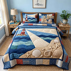 Lighthouse Ocean Breeze quilted 3-piece bedding set on a made bed in a light coastal bedroom