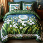 Lily Butterfly Night quilted 3-piece bedding set on a made bed with two matching pillow shams