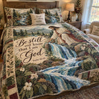 Living Waters quilted 3-piece bedding set on a made bed with two matching pillow shams