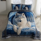 Lone Guardian Wolf Blue quilted 3-piece bedding set on a made bed with two matching pillow shams