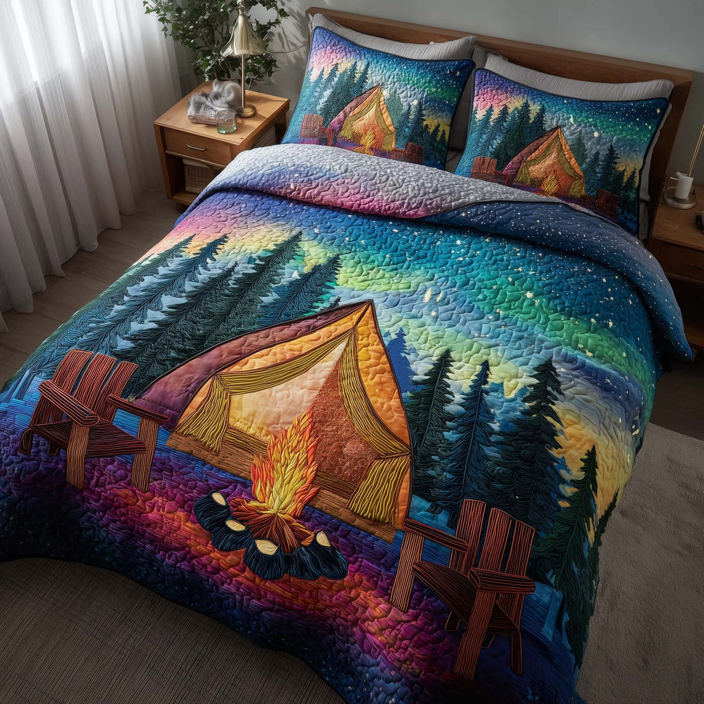 Midnight Harmony Tent Aurora quilted 3-piece bedding set on a made bed with two matching pillow shams