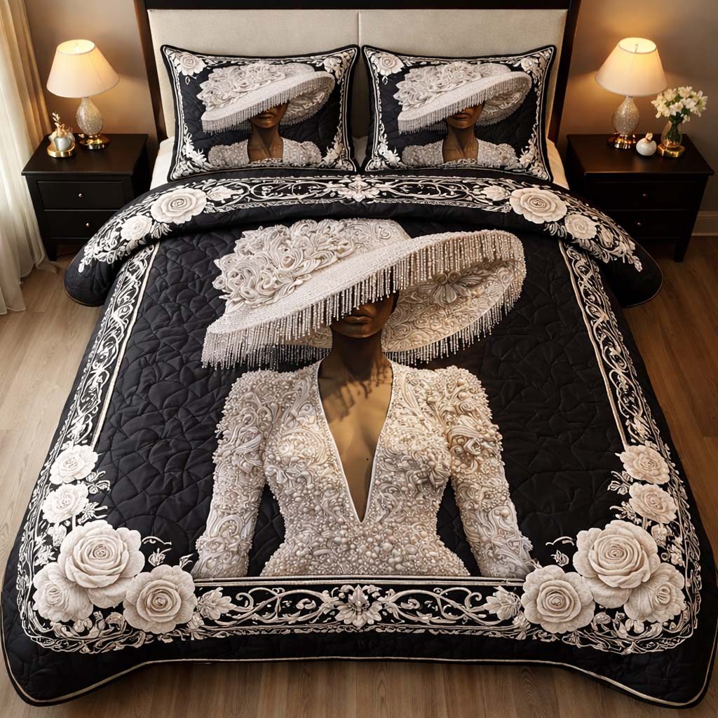 Midnight Pearl Muse quilted 3-piece bedding set on a made bed with two matching pillow shams