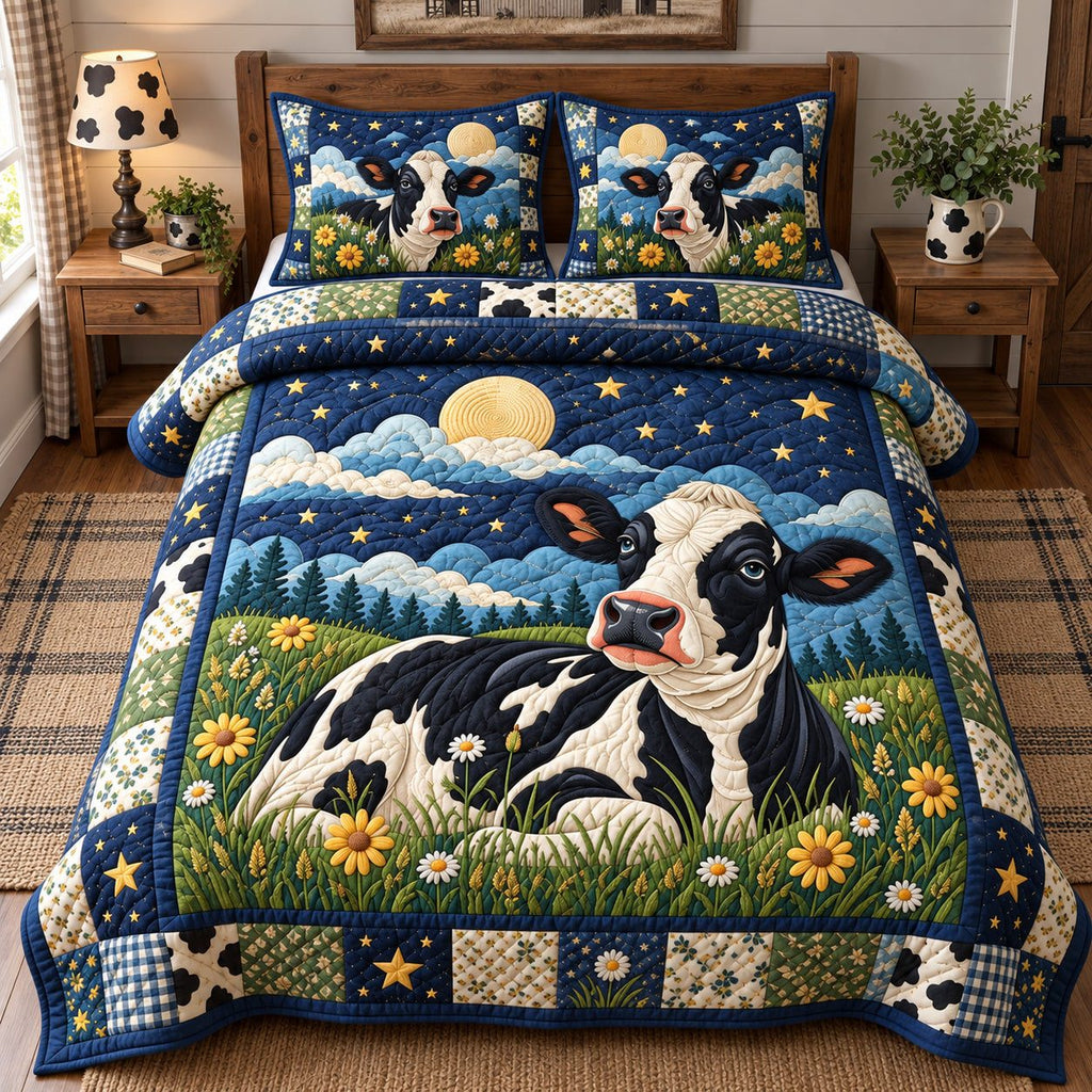 Moonlight Meadow Cow quilted 3-piece bedding set on a made bed with two matching pillow shams