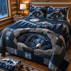 Moonlit Bear Cave quilted 3-piece bedding set on a made bed with two matching pillow shams