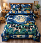 Moonlit Dairy Pasture quilted 3-piece bedding set on a made bed with two matching pillow shams
