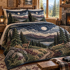 Moonlit Elk Wilderness quilted 3-piece bedding set on a made bed with two matching pillow shams