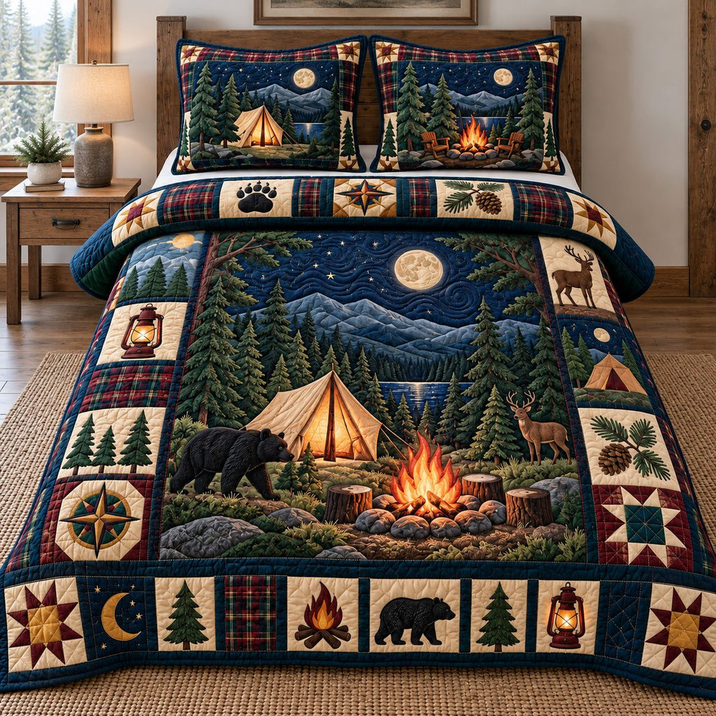 Moonlit Tent Bear Camping quilted 3-piece bedding set on a made bed with two matching pillow shams