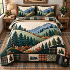Mountain Forest quilted 3-piece bedding set on a made bed with two matching pillow shams
