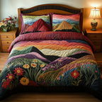 Mountains Embrace Rainbow quilted 3-piece bedding set on a made bed with two matching pillow shams