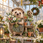 Custom-shaped acrylic ornament with hedgehog holding a garden bouquet, greenhouse details and gold cord.