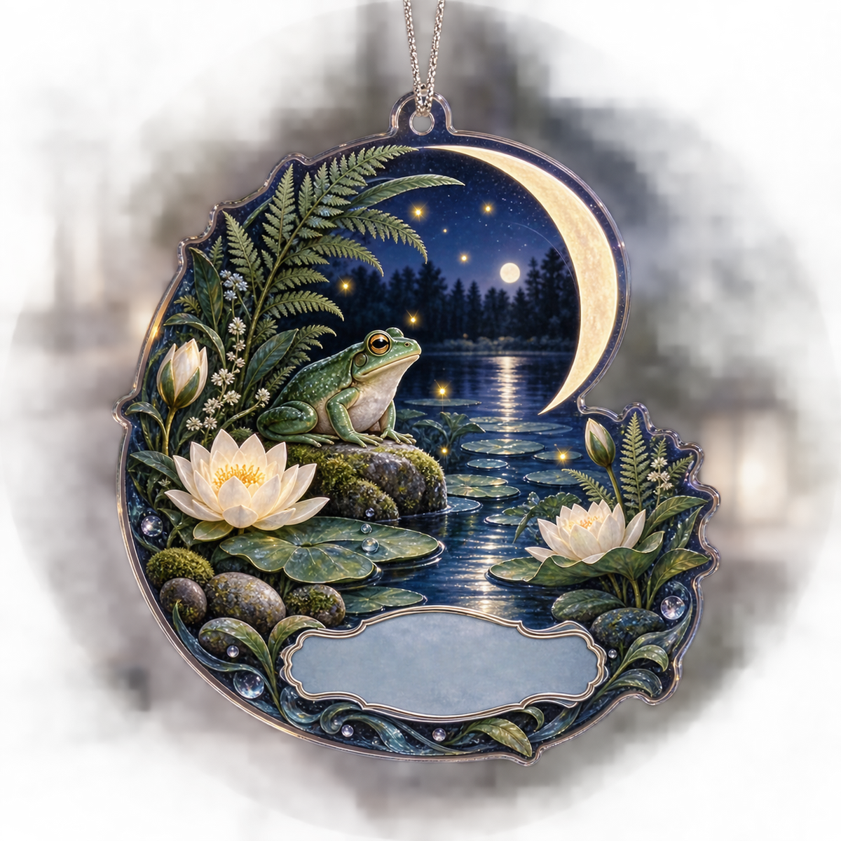 One christmas ornament with a jade frog, moonlit indigo pond, lily pads, ivory lotus, fireflies, ferns, crescent arch and a blank mist-blue plaque.