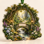 One christmas ornament with a monumental moss-covered stone arch entwined with roots, a sweeping path crossing an arched stone bridge over a clear woodland stream, a radiant fern glade, hydrangea, anemones, foxgloves, golden light, two antique brass lanterns and a blank parchment plaque.