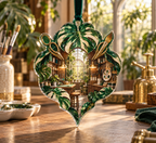 One christmas ornament with an original Monstera Makerlight Atelier and deep hobby-studio illusion.