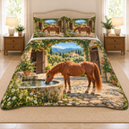A chestnut horse drinks from a stone trough in a cobbled courtyard, with ivy archway, open stable doors and distant orchard hills.