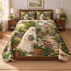 Thin quilt and two shams with a printed friendly sheet ghost watering terracotta flowerpots in a garden