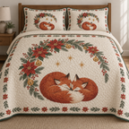 One lightweight quilt and two shams with printed curled foxes, poinsettia crescent and bells, green binding and visible quilt stitching