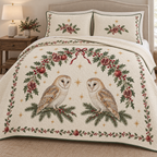 One ivory quilt and two matching shams with two printed barn owls beneath holly pomegranate arch, evergreen binding and meandering channels
