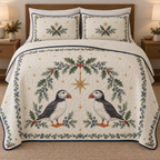 One ivory quilt and two matching shams with printed puffin pair, holly juniper star arch, navy binding and dense quilting
