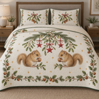 One ivory quilt and two shams with printed dormouse pair holding hazelnuts beneath mistletoe ribbon stars, green binding and dense quilting
