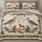 One ivory quilt and two matching shams with paired Eurasian curlews cranberry rocking horse orange slices cedar juniper holly ochre stars navy binding sewn meandering quilting