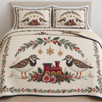 One ivory quilt and two matching shams with paired ruddy turnstones cranberry toy train fig halves cedar rosehips holly ochre snowflake stars navy binding sewn quilting