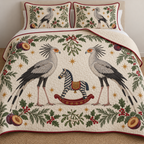 Two illustrated secretarybirds with black quill crests and long legs frame a navy toy rocking zebra with ochre saddle and cranberry rockers, plum halves, cedar, holly, mistletoe and ochre stars on ivory with cranberry binding. Flat printed Christmas artwork. Includes one quilt and two matching pillow shams. Visible sewn quilt channels, shallow filling and natural fabric drape.