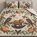 Two illustrated laughing kookaburras with broad bills and barred tails frame a brown toy rocking wombat with ochre saddle and navy rocker, orange halves, cedar, holly, mistletoe and ochre snowflakes on ivory with navy binding. Flat printed Christmas artwork. Includes one quilt and two matching pillow shams. Visible sewn quilt channels, shallow filling and natural fabric drape.