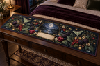 One table runner with a luminous moonlit oval window framed by blackberry, raspberry, blueberry and red-currant brambles, deep leaves, cream blossoms, luna moths, faceted dew, amber fireflies and a blank parchment plaque.