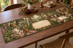 One table runner with a woodland tea picnic, home hobby studio, creative tools and blank parchment name plaque.