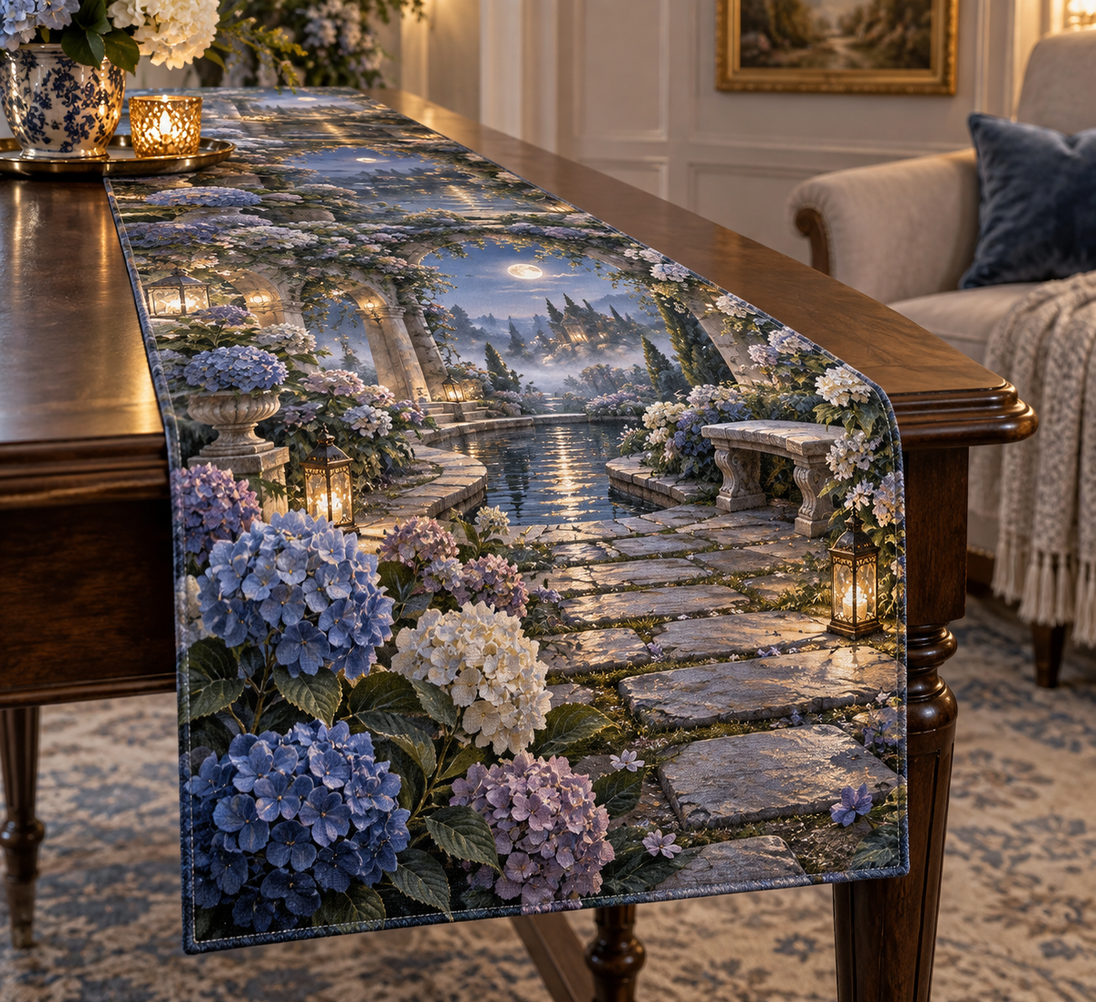 One table runner with a continuous moonlit hydrangea courtyard, indigo, mist-blue, pearl and dusty-lilac blooms, silver arches, lanterns, reflecting water and a secluded bench.