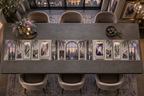 One table runner with an original Wisteria Prism Loft Gallery, layered botanical frames, opal windows and city-dusk depth.