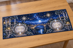 Example EMMA and LIAM moonstone-style medallions, two decorative star clusters linked above an arched stone bridge, indigo valley, birches and distant castle hills.