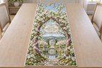 Example WELCOME / EMMA & LIAM / JUNE 15, 2026 porcelain-style oval plaque between intertwined pear blossom trunks, lilac ribbon, stone footbridge reflecting pond blossom orchard orangery hills sky.