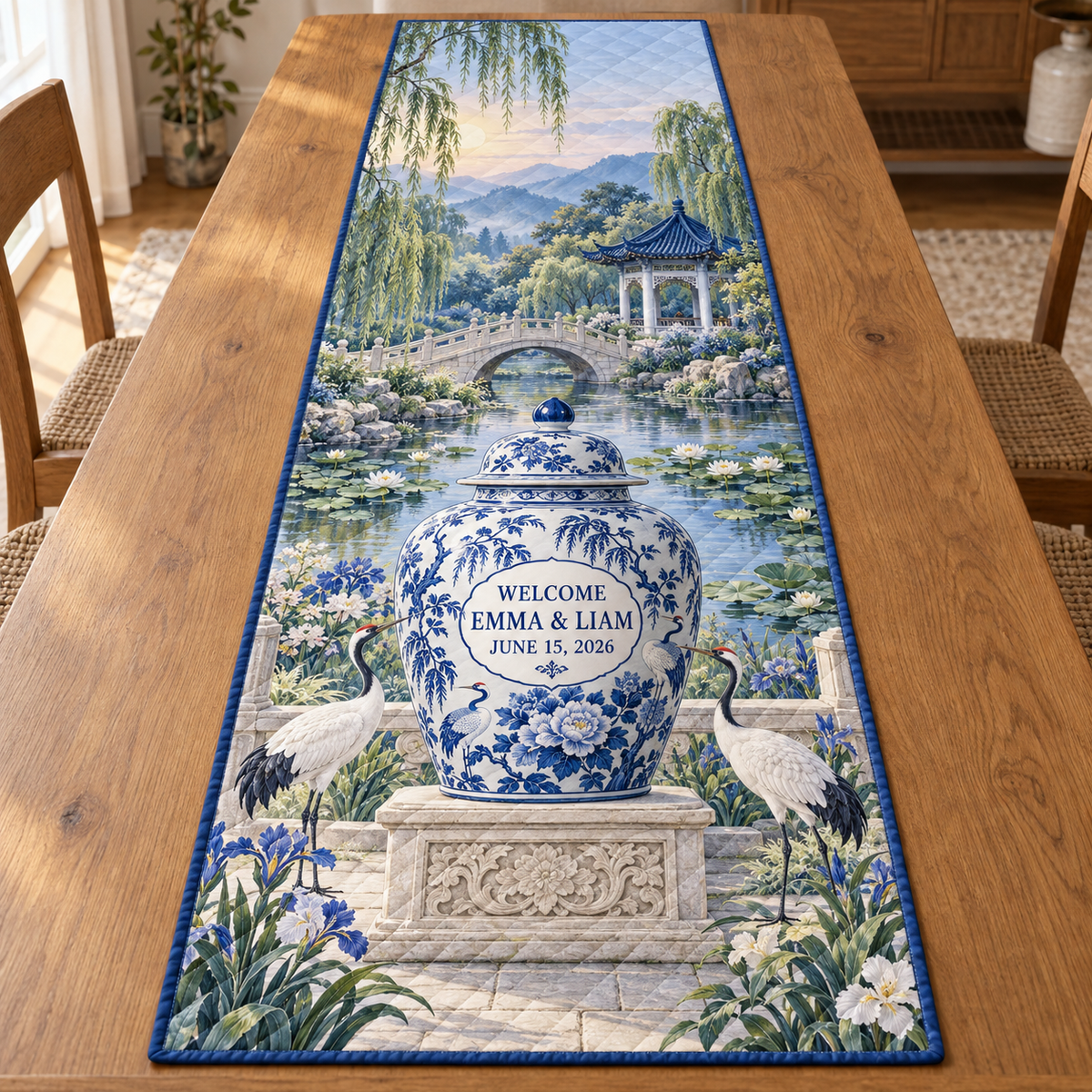 Example WELCOME / EMMA & LIAM / JUNE 15, 2026 blue-white ginger jar with welcome cartouche on stone pedestal two white cranes irises willow garden footbridge lily pond pavilion misty hills dawn sky.