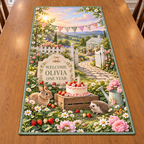 Example WELCOME / OLIVIA / ONE YEAR ivory scalloped welcome plaque strawberry cake numeral1 candle baby rabbit hedgehog watering can flowers bunting picket gate greenhouse hills sky.